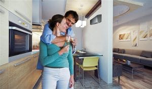 Boise Home Inspectors couple drinking wine in their new home