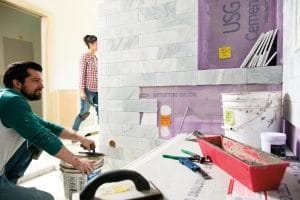 man-painting-the-house