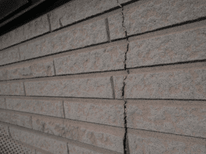 Crack in exterior brick wall of a Boise, ID home during maintenance inspection.